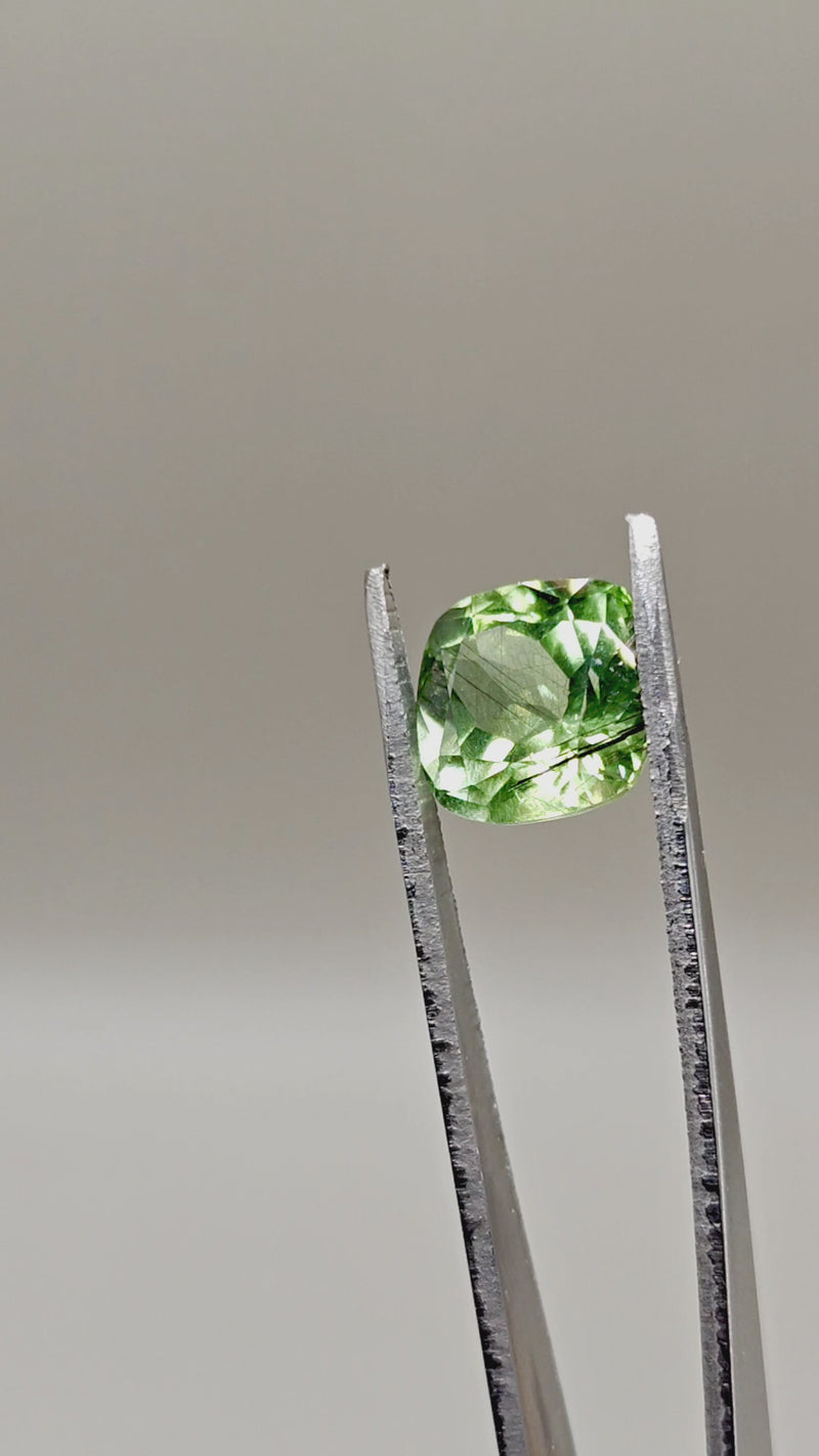Natural Peridot with Rutile — 7.87 ct — Cushion