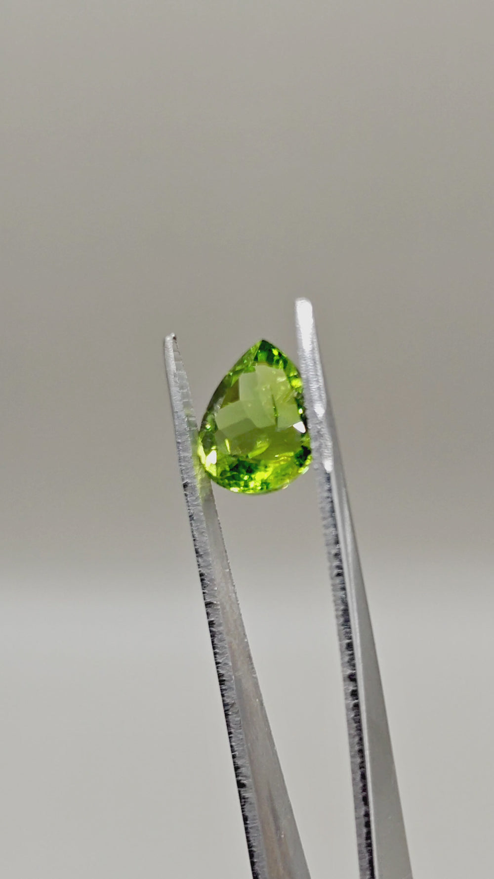 Natural Apple Green Peridot 7.39 ct Pear – video